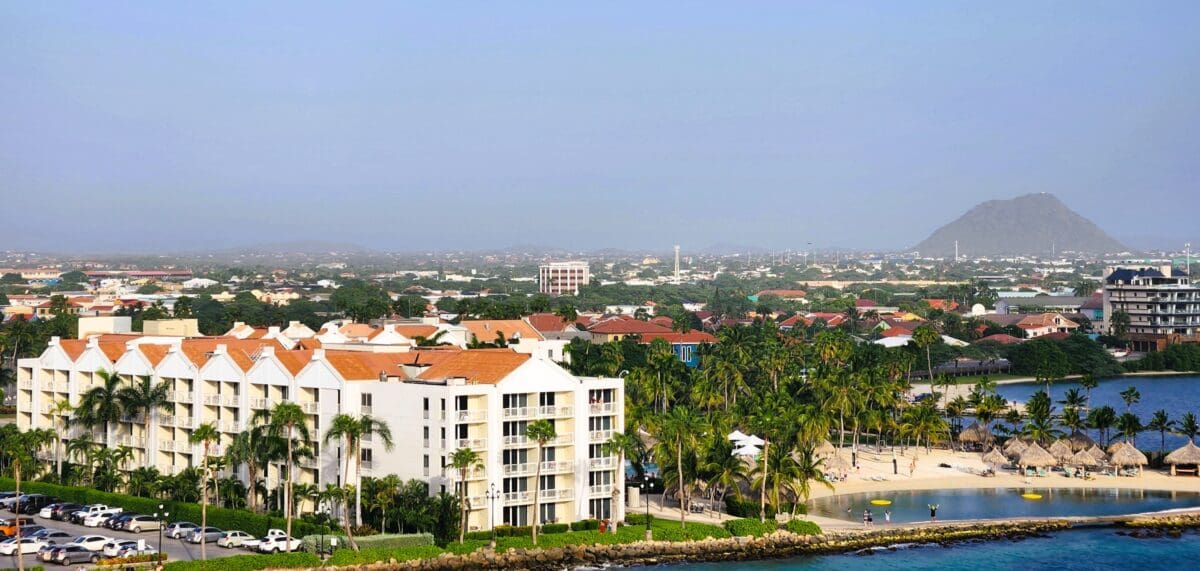 Aerial view of Aruba coastline and resorts seen from a cruise ship – Caribbean island arrival scenery