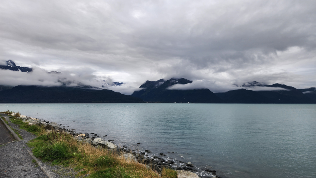 Mountain and bay views from Founders Monument in Seward, Alaska with clouds over the Kenai Mountains