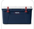 YETI Tundra 45 Cooler in blue with red latches for camping, road trips, and outdoor adventures.