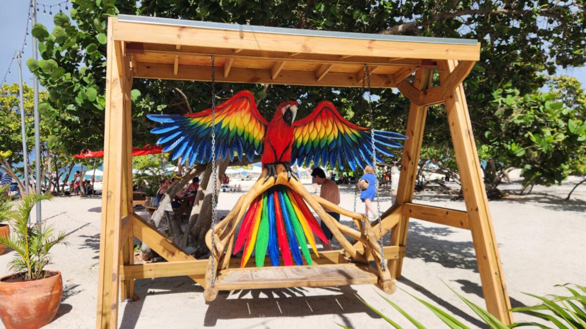 Colorful parrot bench at Coco Loco area on Eagle Beach Aruba