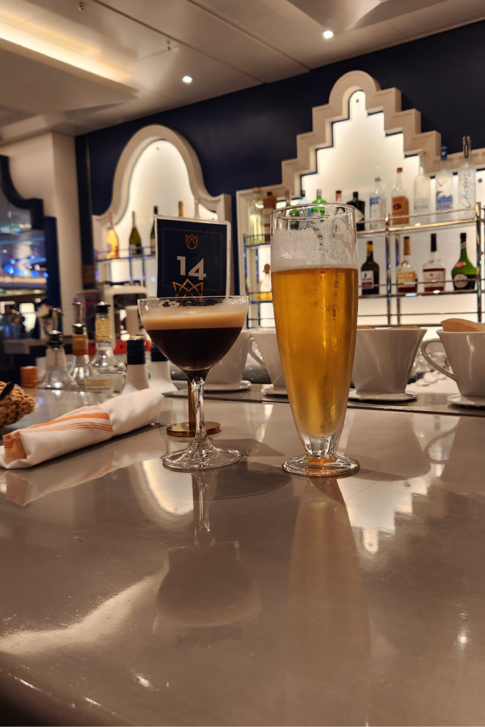Grand Dutch Café Drinks - Dohrn Travels Beer and espresso martini at Grand Dutch Café on Holland America Rotterdam. Holland America Have It All package worth it