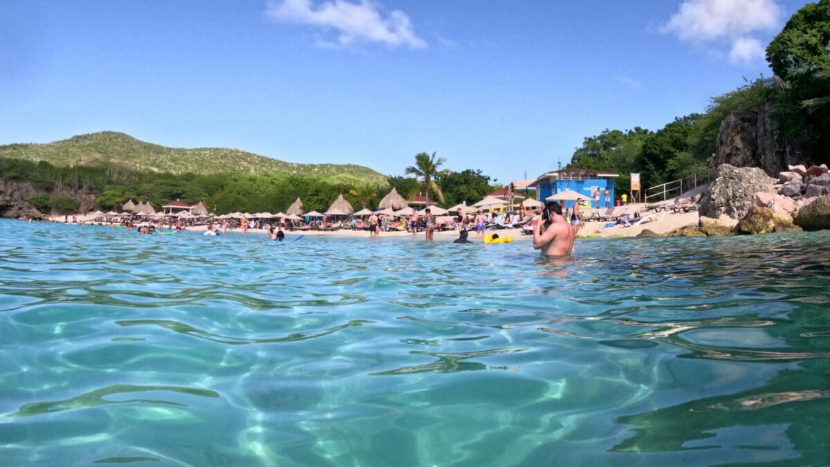 Swimming Conditions at Grote Knip Beach | Dohrn Travels Shallow swimming area at Grote Knip Beach Curaçao with beach in background