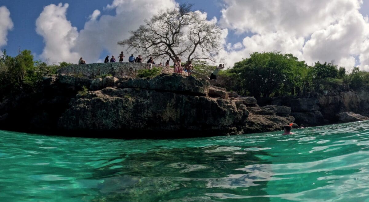 Cliff Jumping at Grote Knip Beach | Dohrn Travels Cliff jumping area at Grote Knip Beach Curaçao viewed from the water