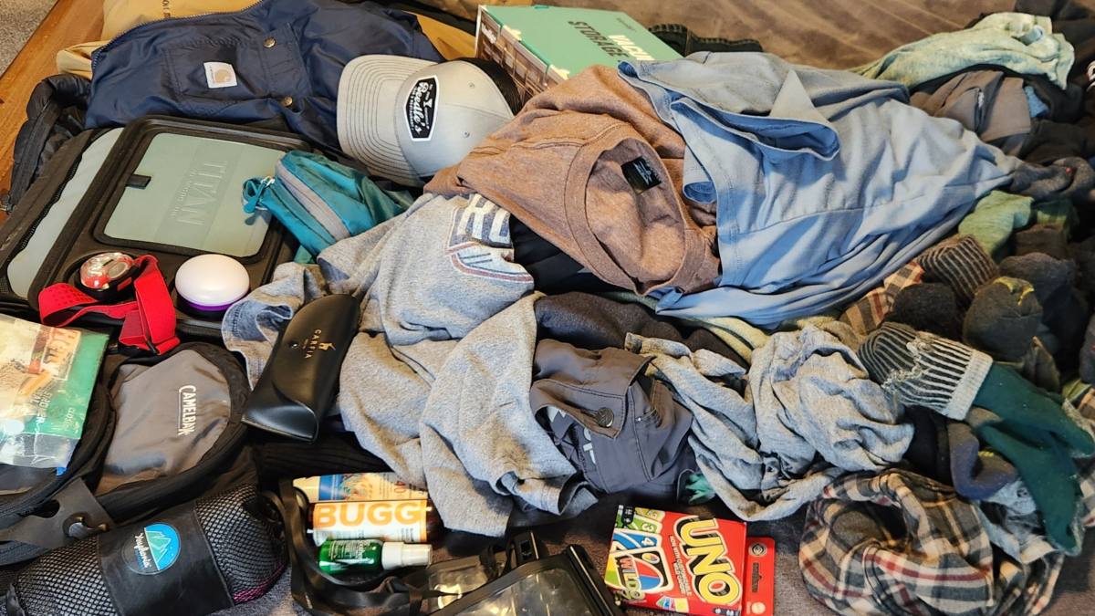 overpacked suitcase with too many clothes showing common cruise packing mistakes. what to pack for a cruise