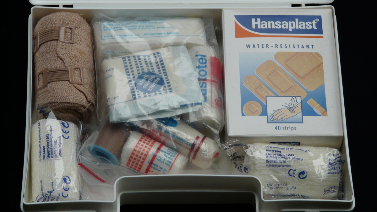 travel first aid kit with bandages and medical supplies for cruise packing essentials