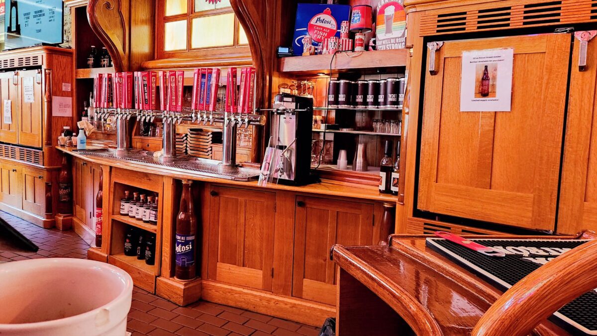 Beer taps and bar area inside Potosi Brewery brewpub