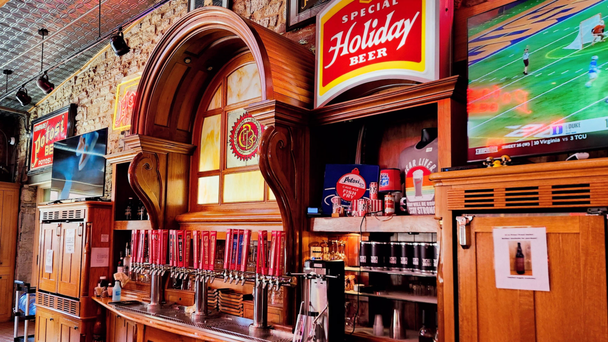 Close view of beer taps and bar setup at Potosi Brewery