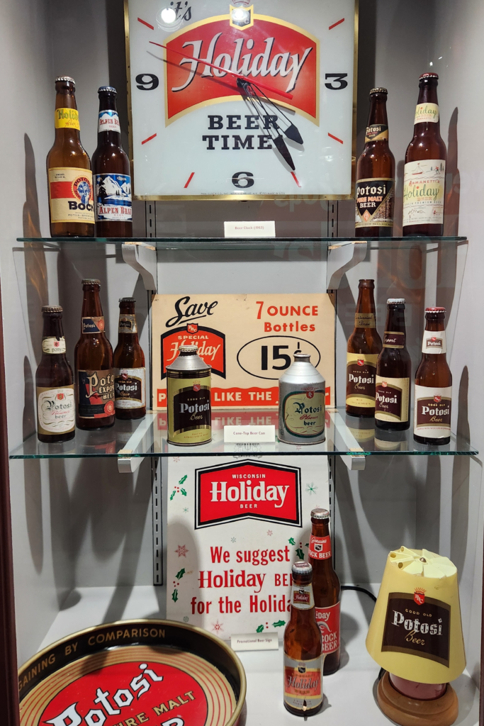 Holiday Beer display and vintage bottles inside Potosi Brewery museum