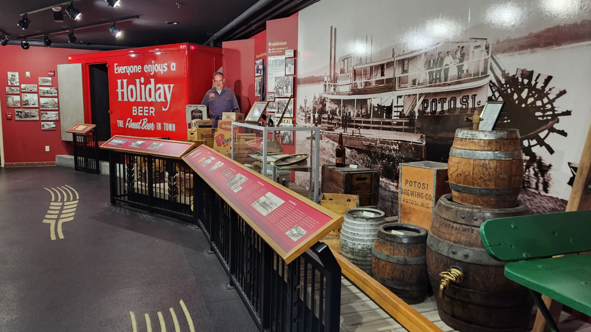 Transportation museum inside Potosi Brewery with historic beer displays and riverboat mural