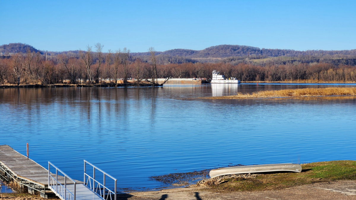 Barge floating down Mississippi River near Eagle Roost Resort Cassville Wisconsin