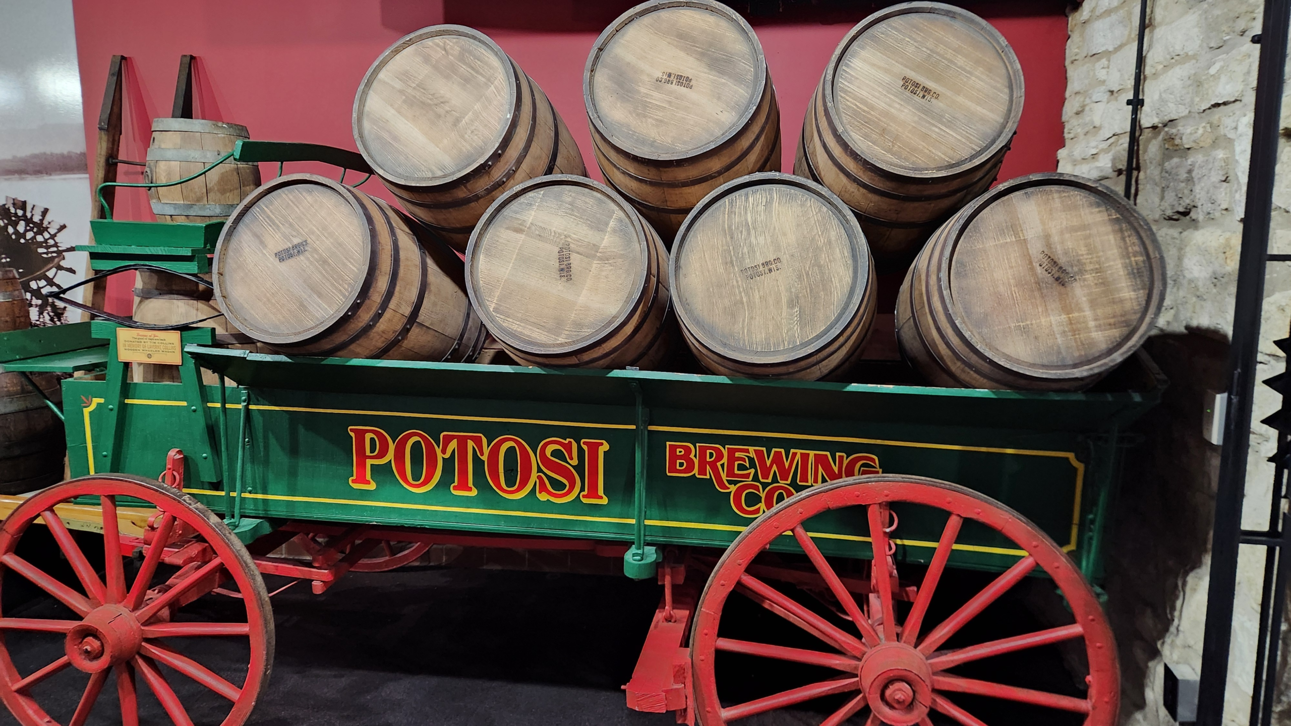 Historic horse wagon with beer barrels inside Potosi Brewery museum