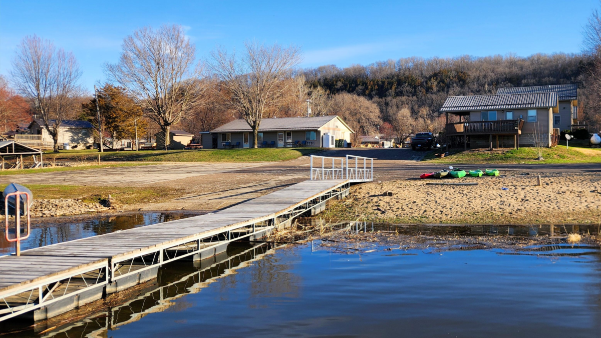 Eagle Roost Resort cabins and dock view from Mississippi River shoreline. Rivers Edge cabin Cassville WI