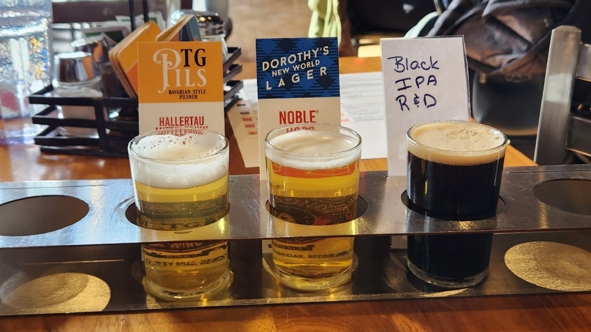 Craft beer sampler flight with stout and lagers at Toppling Goliath Brewing