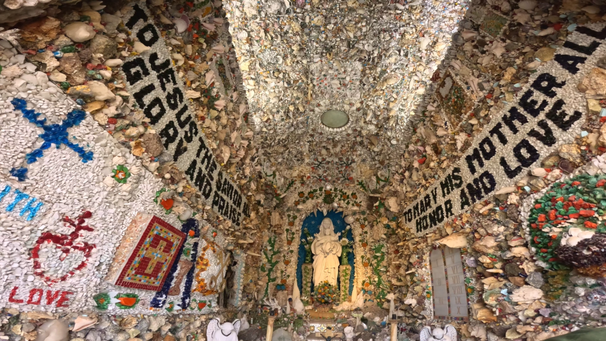 Interior shell mosaic shrine at Dickeyville Grotto with religious statues and artwork