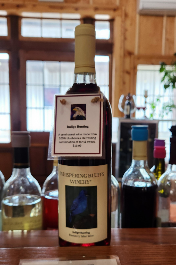 Indigo Bunting blueberry wine bottle at Whispering Bluffs Winery Potosi WI. sweet wines Wisconsin