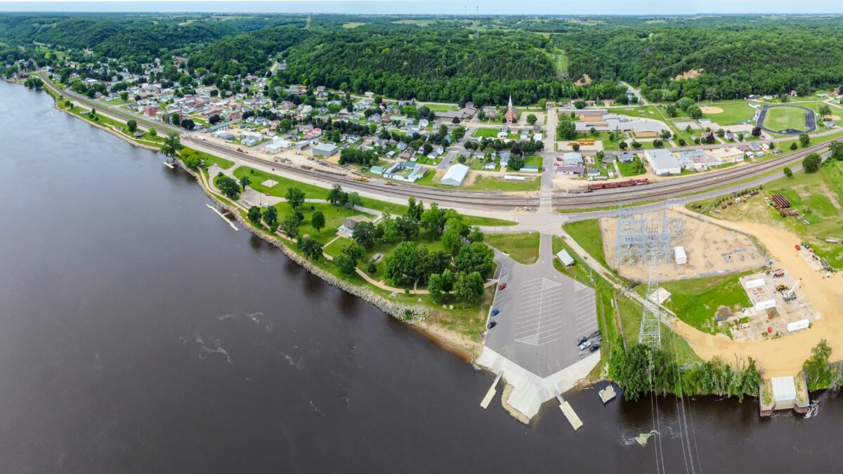 Cassville, Wisconsin Aerial View | Dohrn Travels Drone view of Cassville, Wisconsin, along the Mississippi River with the ferry landing, downtown, and surrounding Driftless Area hills.
