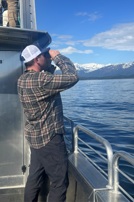 Looking for humpback whales during a Juneau whale watching excursion in Alaska