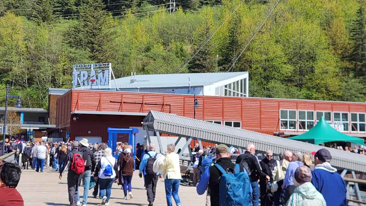 Cruise passengers walking near the Mt. Roberts Tramway in Juneau Alaska
