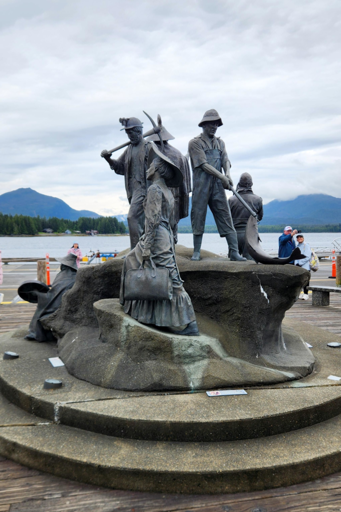 The Rock statue honoring Ketchikan fishermen and pioneers on the downtown waterfront.