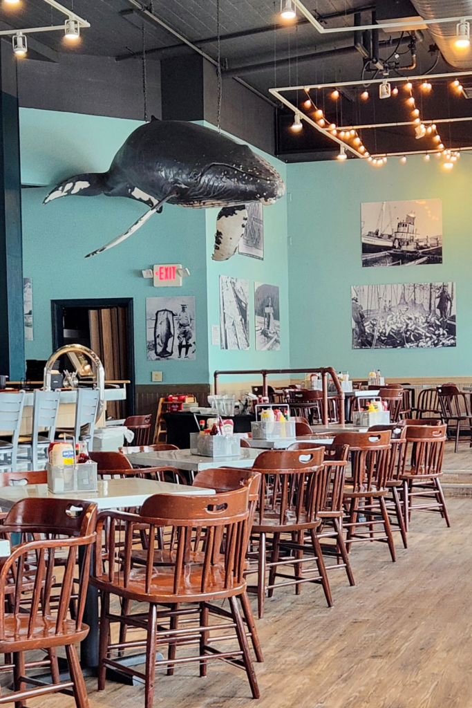 Large humpback whale model hanging inside Alaska Crab Company restaurant in Ketchikan, Alaska.