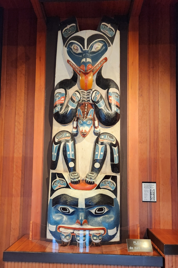 Historic Alaska Native totem pole displayed inside Sitka National Historical Park Visitor Center