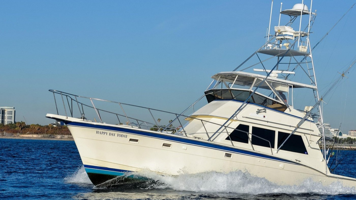 Hatteras sportfishing boat cruising near Fort Lauderdale Florida