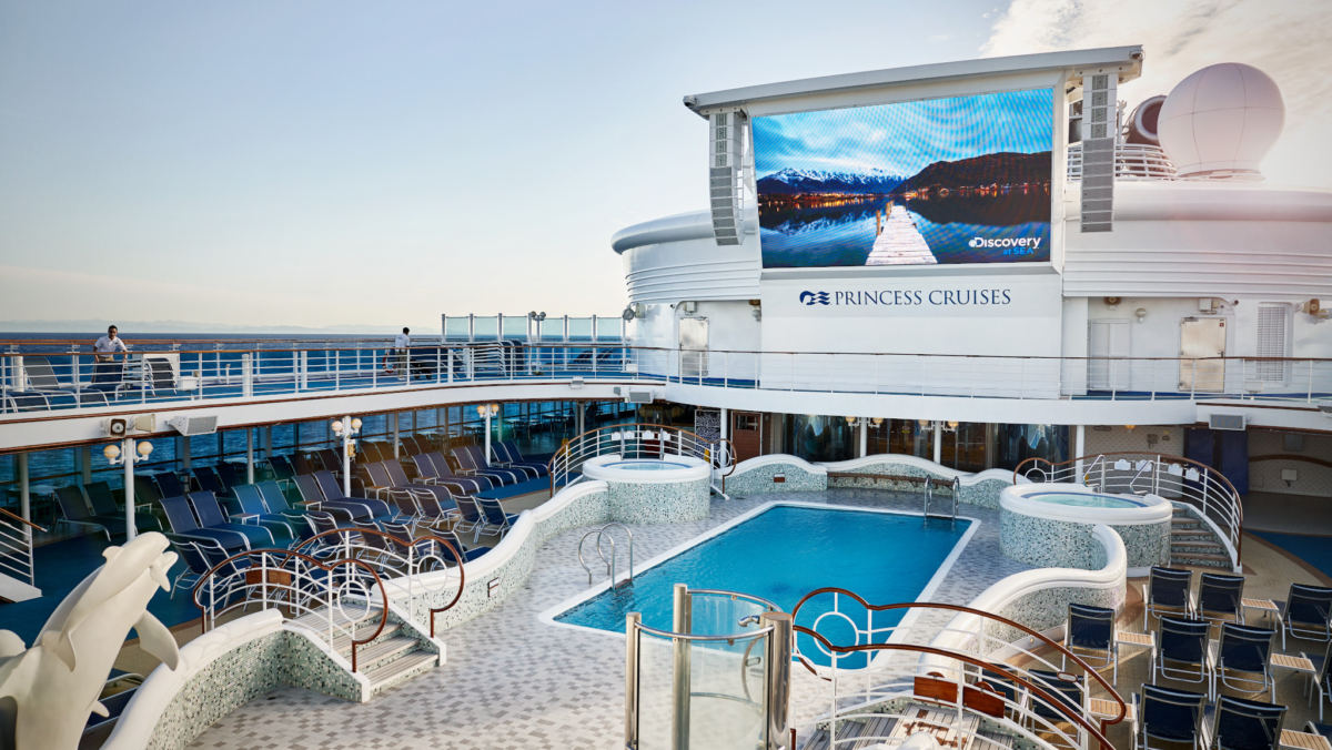 Diamond Princess pool deck with swimming pool and Movies Under the Stars screen
